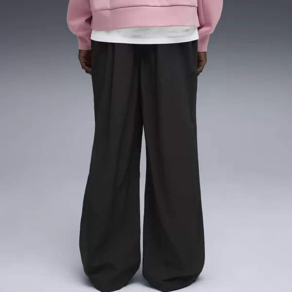 Nadrág PUMA WARDROBE ESS OVERSIZED PARACHUTE PANTS WV OP 63206801 PUMA FEKETE 
