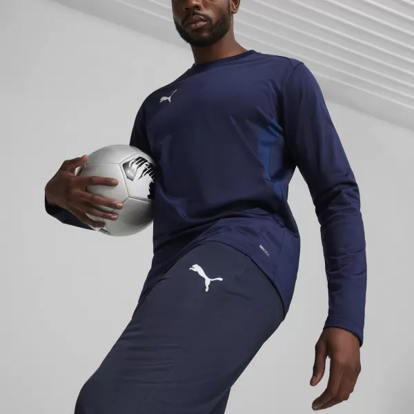  Nadrág PUMA TEAMGOAL TRAINING PANT 658639_06 PUMA NAVY/FEHÉR/PERZSA KÉK 
