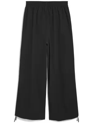 Nadrág PUMA WARDROBE ESS OVERSIZED PARACHUTE PANTS WV OP 63206801 PUMA FEKETE