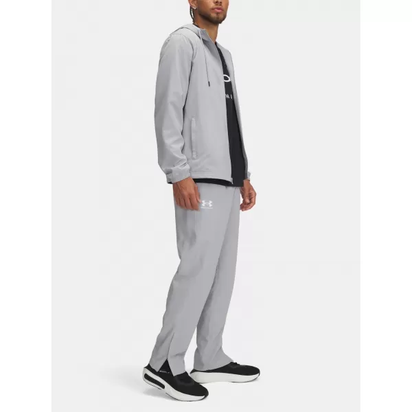  Férfi sportnadrág UNDER ARMOUR UA RIVAL WVN WINDBREAKER PN 1390150-011 SZÜRKE 