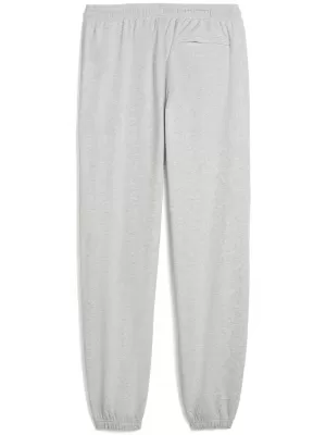 Férfi melegítőnadrág PUMA M GRAPHIC FRENCH TERRY JOGGER 52770304 VILÁGOSSZÜRKE HANGA