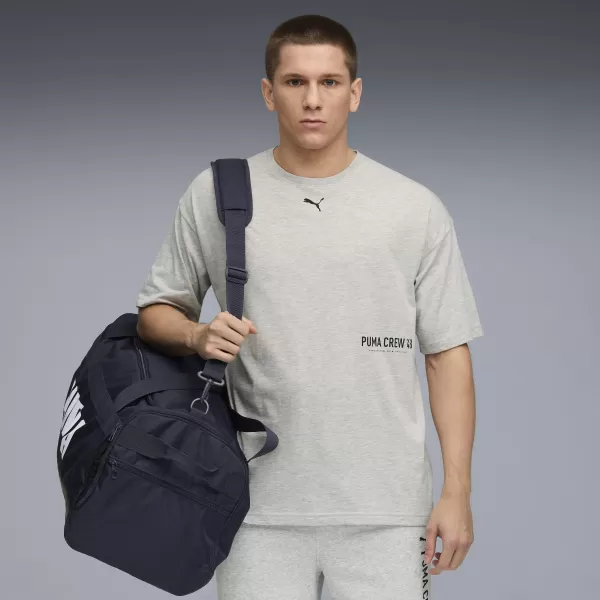  Férfi póló PUMA M GRAPHIC OVERSIZE TEE 52762604 VILÁGOSSZÜRKE HANGA 