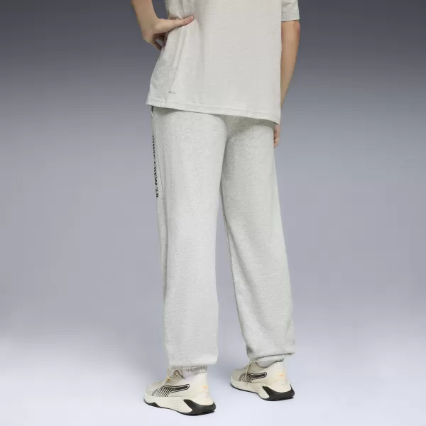  Férfi melegítőnadrág PUMA M GRAPHIC FRENCH TERRY JOGGER 52770304 VILÁGOSSZÜRKE HANGA 