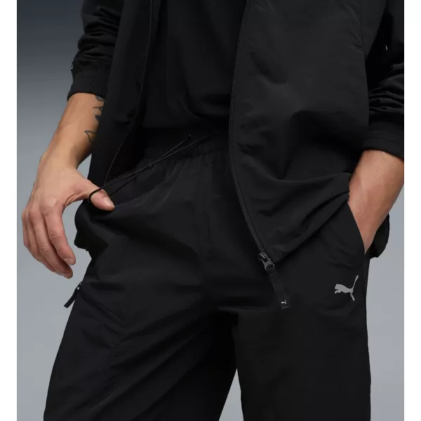  Nadrág PUMA TECH WOVEN CARGO PANTS CL 68804601 PUMA FEKETE 