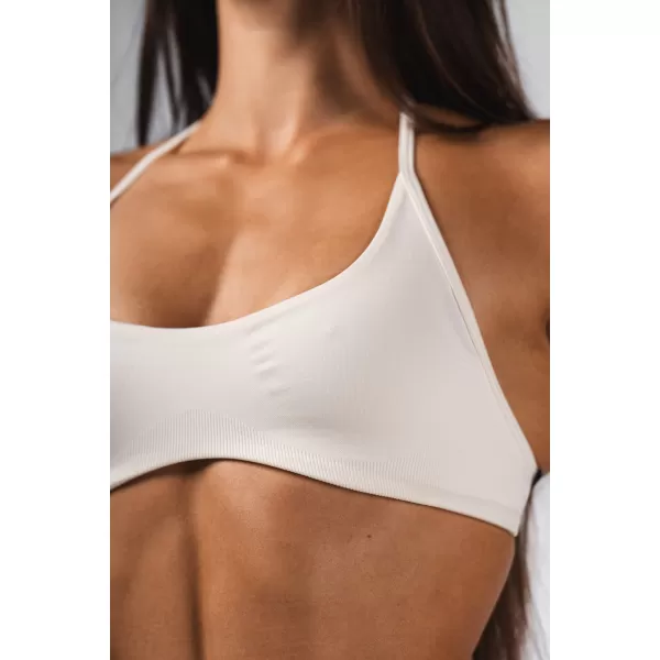  Varrat nélküli felemelhető sportmelltartó FLOW SEAMLESS 495 CREAM Nebbia 