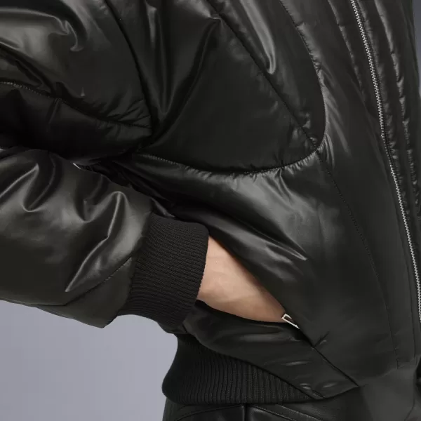 Női kabát PUMA DARE TO PUFFER JACKET 63217301 PUMA FEKETE 