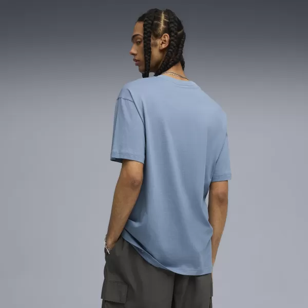  Férfi póló PUMA GRAPHIC WORLD TOUR TEE 632112-34 HIDEG KÉK 