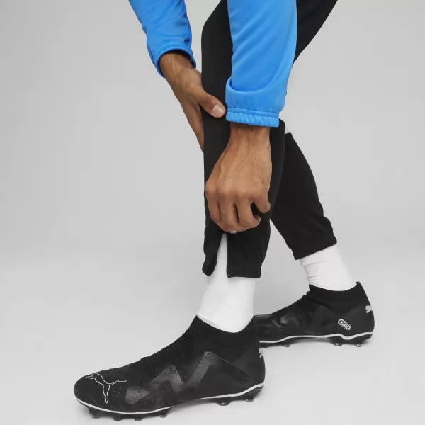  Férfi tréningruha szett PUMA TEAMRISE TRACKSUIT 658653_02 IGNITE BLUE/ KÉK/PUMAFEKETE GYÚJTÁS 