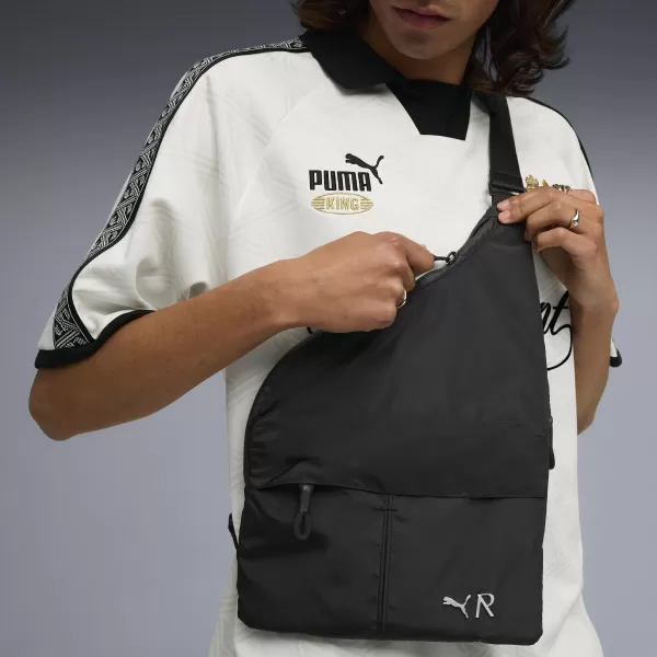  Táska PUMA X REPRESENT SLING BAG 091822-01 PUMA FEKETE 