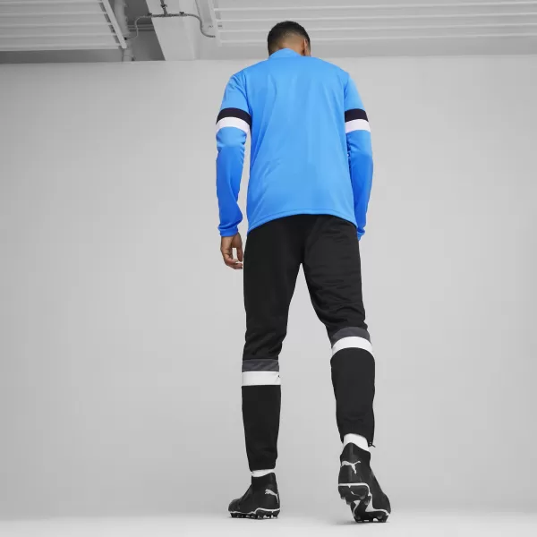  Férfi tréningruha szett PUMA TEAMRISE TRACKSUIT 658653_02 IGNITE BLUE/ KÉK/PUMAFEKETE GYÚJTÁS 