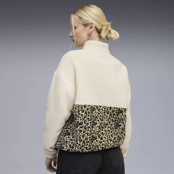  Női pulóver PUMA ESS GRAPHIC ANIMAL CREW 688083-87 ALPESI HÓ 