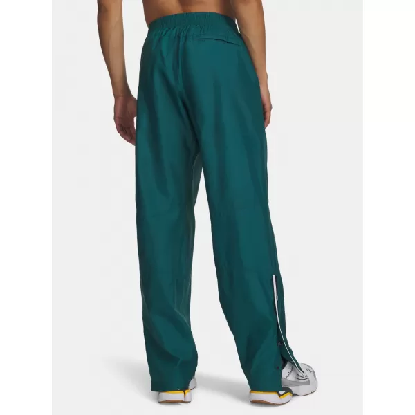  Férfi nadrág UNDER ARMOUR UA ICON SW WOVEN PANTS 6009445-338 ZÖLD 