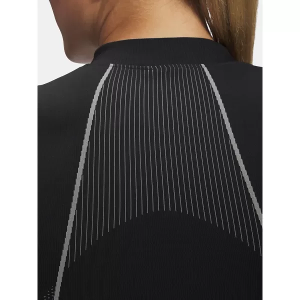  Női póló UNDER ARMOUR VANISH SEAMLESS LS 6000645-004 FEKETE 
