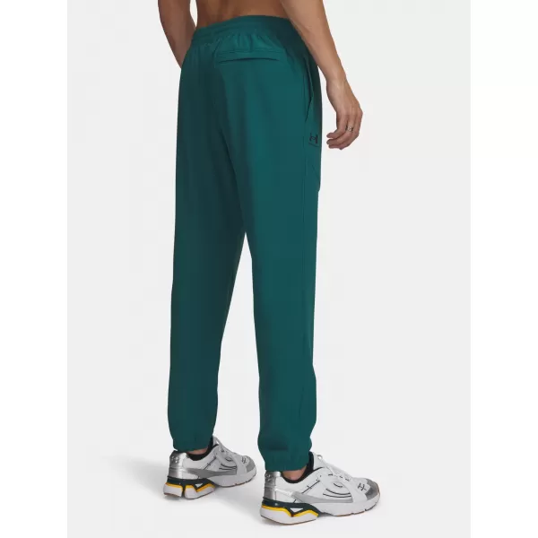  Férfi melegítőnadrág UNDER ARMOUR VIBE WOVEN JOGGER 1386557-338 ZÖLD 