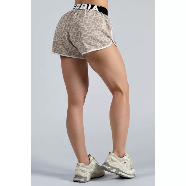  Leopárdmintás edzőnadrág NEBBIA PRIMAL 855 KRÉMLEOPÁRD 