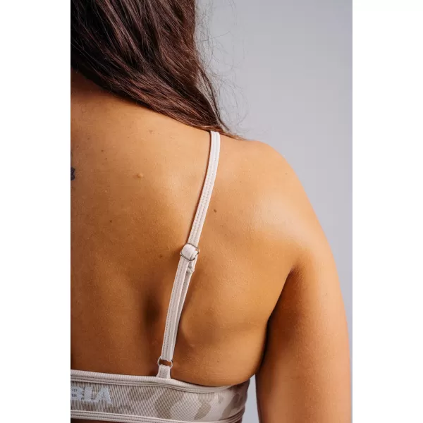  Közepes tartású leopárdmintás sportmelltartó NEBBIA PRIMAL 854 KRÉMLEOPÁRD 