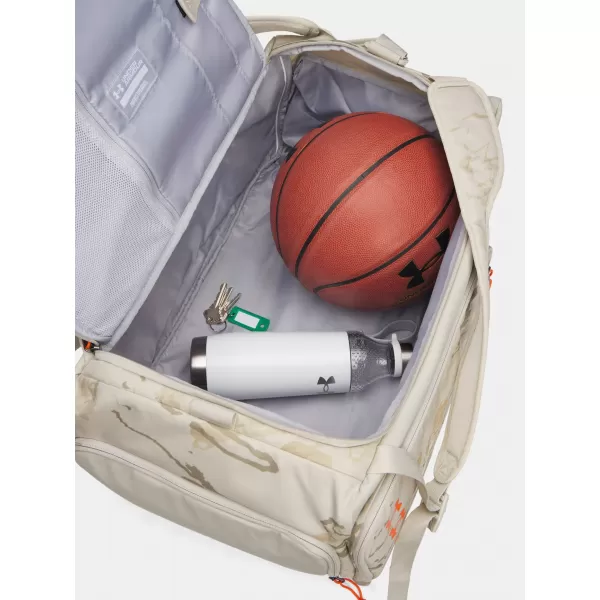  Táska UNDER ARMOUR CONTAIN DUO MD BP DUFFLE 1381919-289 BARNA 