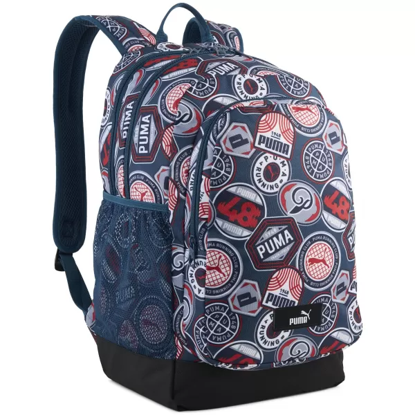  Hátizsák PUMA ACADEMY AOP BACKPACK 09115027 ÉJFÉLI BENZIN/MINDIG PIROS/FUTÓJELVÉNYEK AOP 