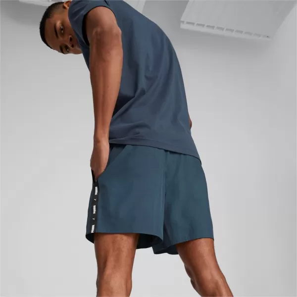  Férfi rövidnadrág PUMA ESS+ TAPE WOVEN SHORTS 849043-16 KÉK 