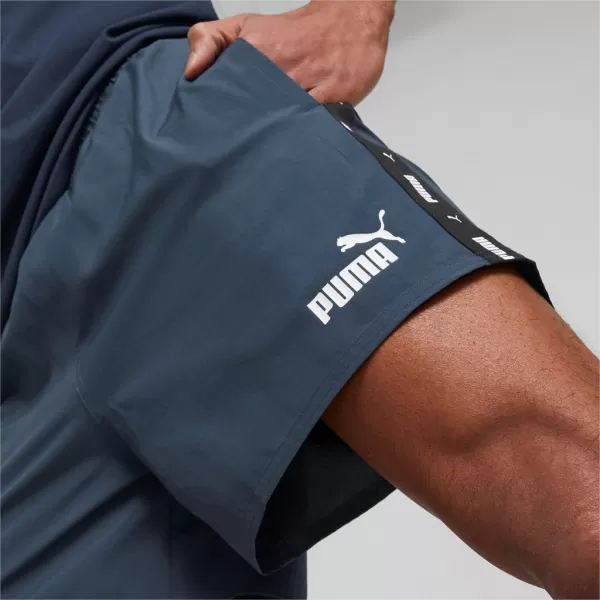  Férfi rövidnadrág PUMA ESS+ TAPE WOVEN SHORTS 849043-16 KÉK 