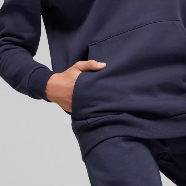  Férfi pulóver PUMA ESS+ LOGO LAB HOLIDAY HOODIE FL 675924-06 KÉK 