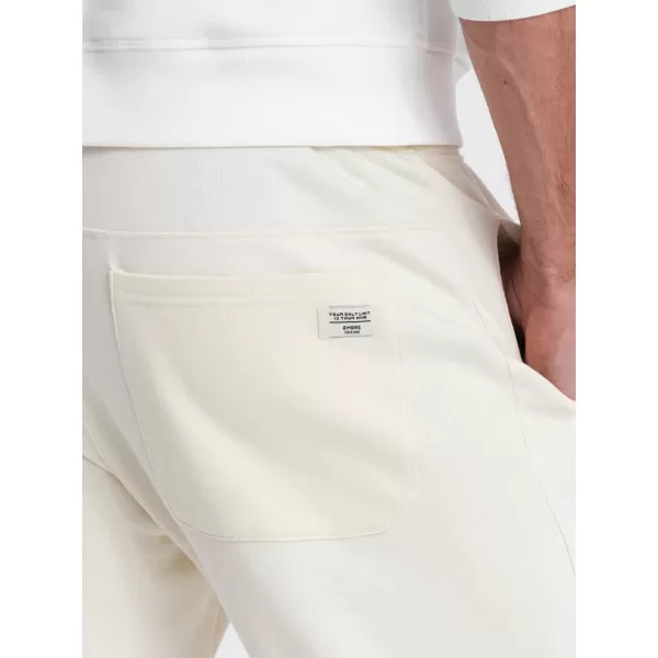  Férfi zeneszámok OMBRE OM-PABS-0173 KRÉM 