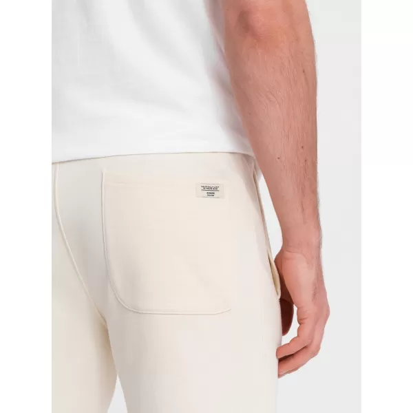  Férfi zeneszámok OMBRE OM-PABS-0206 KRÉM 