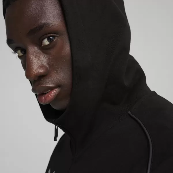  Férfi pulóver PUMA TEAMFINAL CASUALS HOODED JKT 658528_03 PUMA FEKETE/PUMA EZÜST 