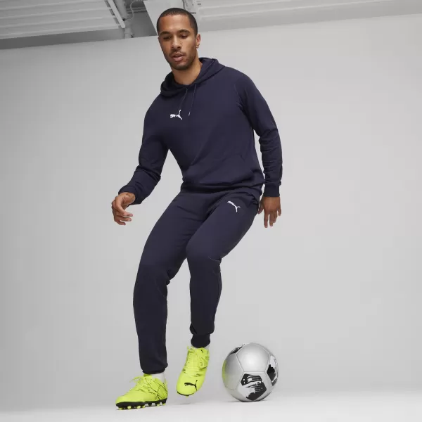  Nadrág PUMA TEAMGOAL CASUALS PANTS 658598_06 PUMA NAVY/PUMA WHITE 