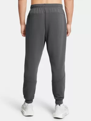 Férfi melegítőnadrág UNDER ARMOUR UNSTOPPABLE FLC JGR EU 1389353-025 SZÜRKE