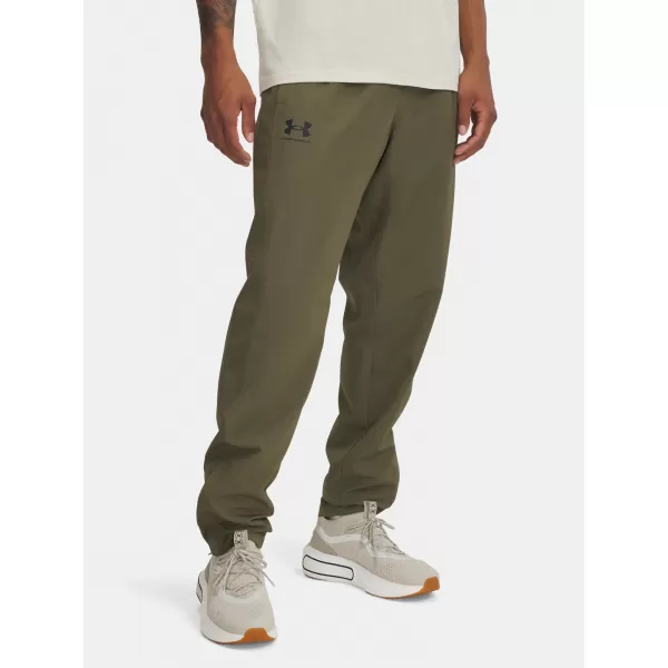  Férfi sportnadrág UNDER ARMOUR RIVAL WVN WINDBREAKER PN 1390150-390 ZÖLD 