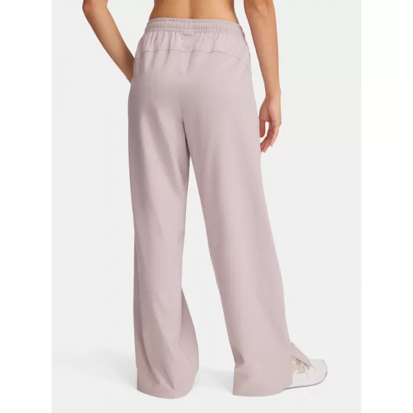  Női sportnadrág UNDER ARMOUR RIVAL WIDE LEG PANT 1386453-009 SZÜRKE 