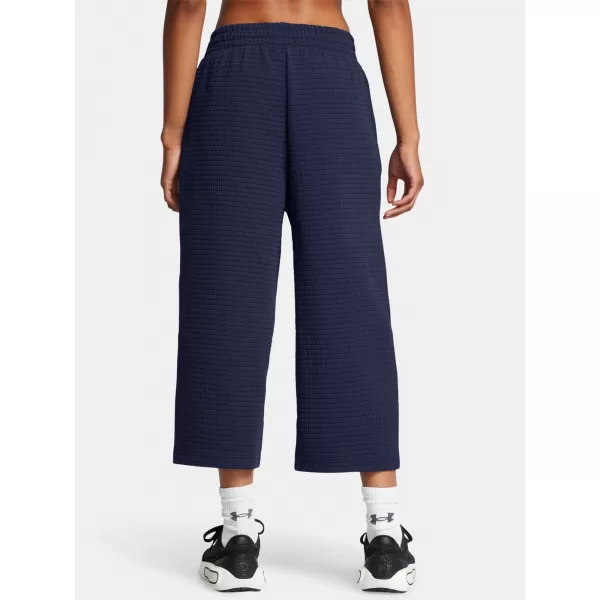  Női sportnadrág UNDER ARMOUR UNSTOPPABLE FLC GRID CROP 1386492-410 KÉK 