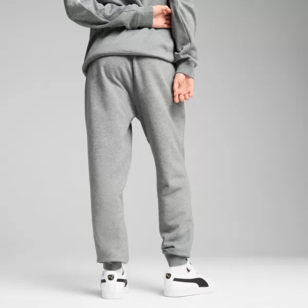  Férfi zeneszámok PUMA ESS SWEATPANTS FL CL 682614-03 SZÜRKE 